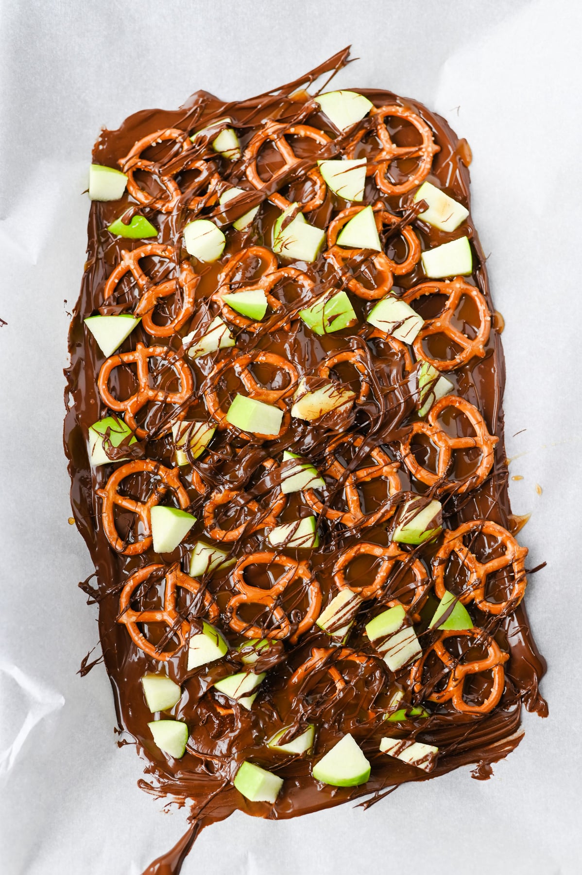Caramel is drizzled on top of the bark.