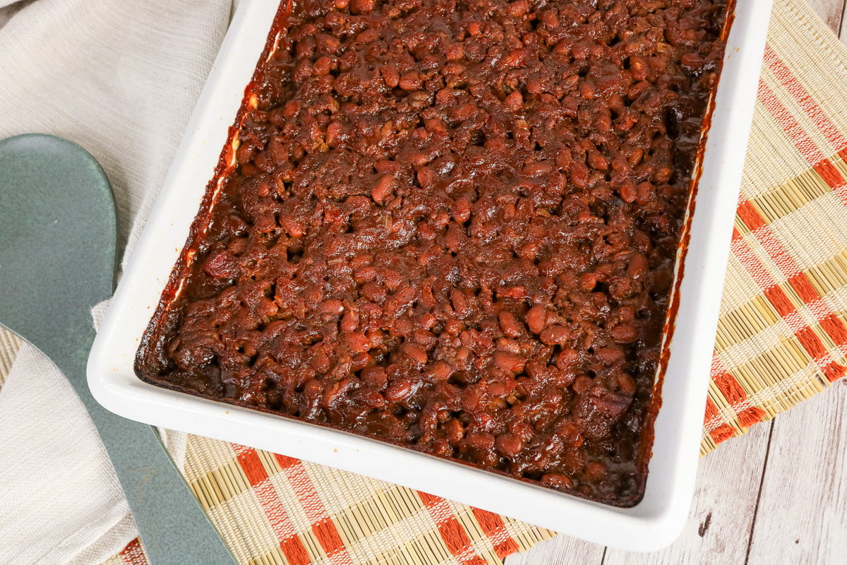 Finished dish of baked beans on 9x13-inch baking dish.