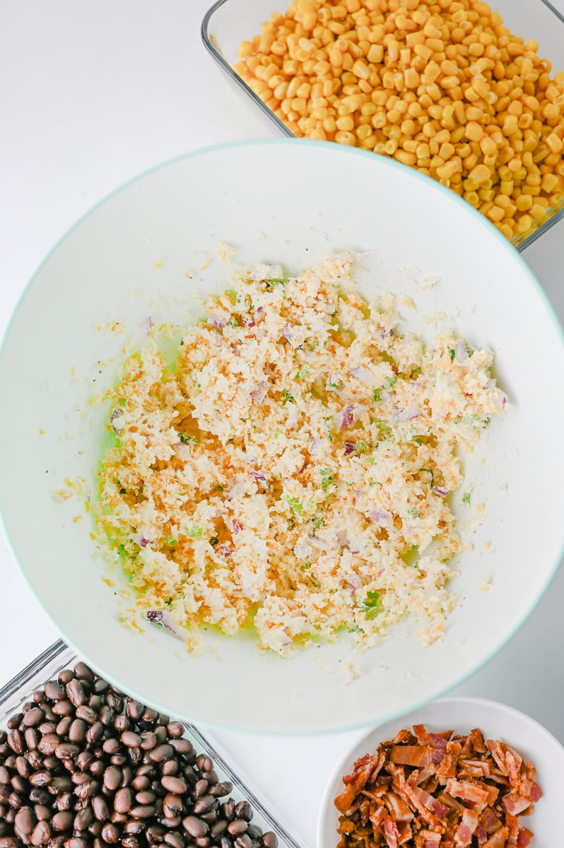 Creamy cheese and mayo in mixing bowl.