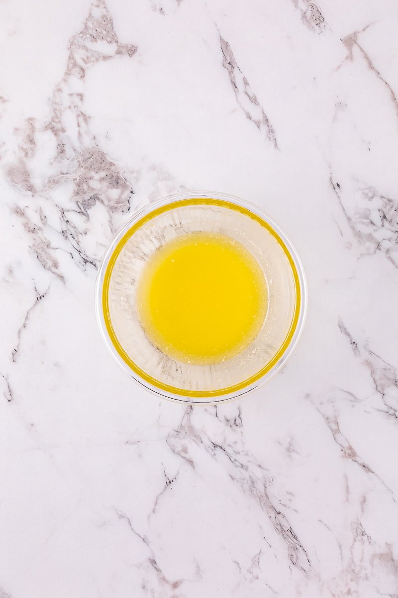 Melted butter in glass bowl.