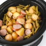 Crockpot swamp potatoes in slow cooker overhead view.