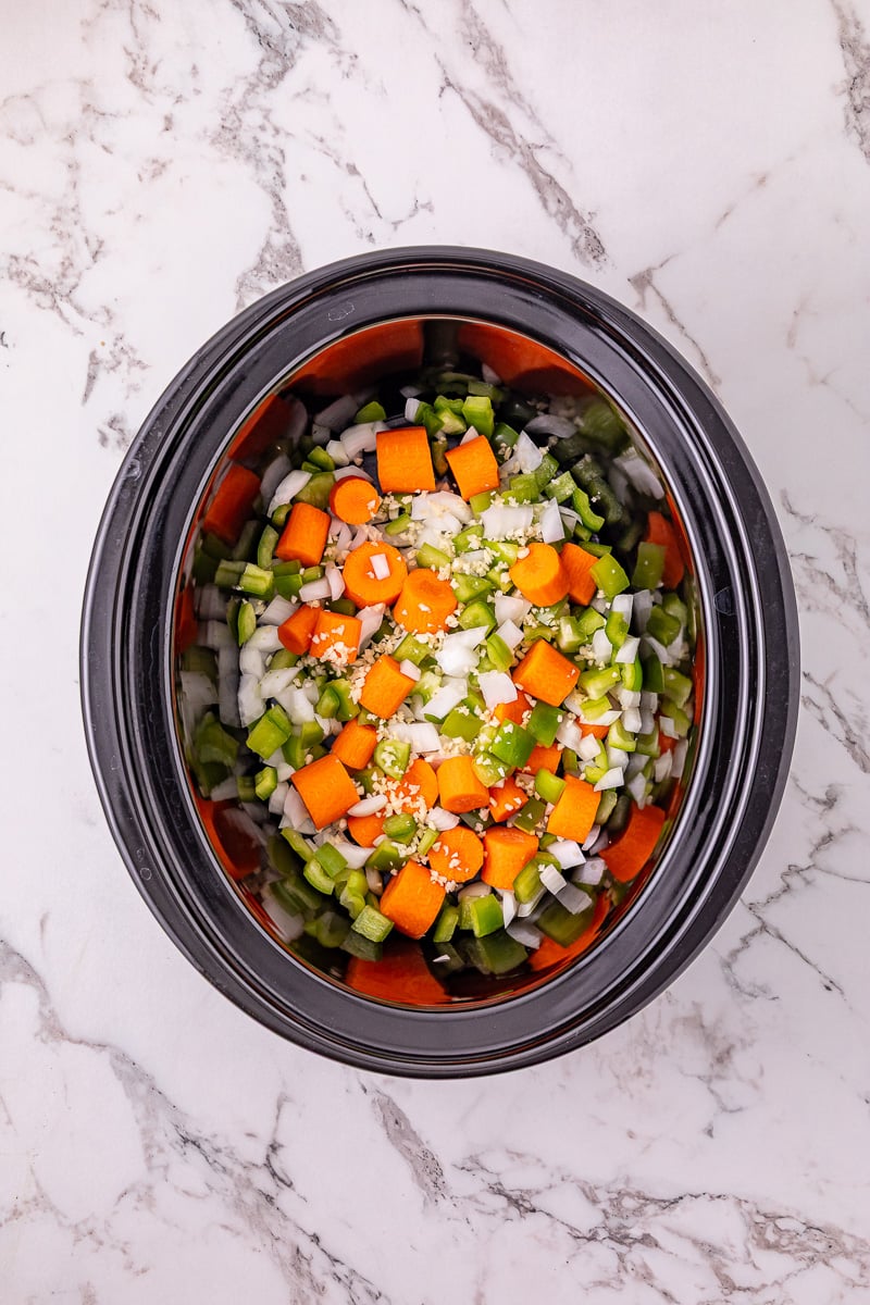 Next set of ingredients are added to bottom of the crockpot.