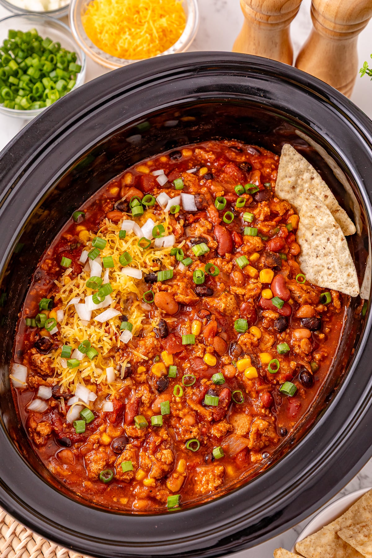 Crockpot turkey chili in slow cooker ready to serve.