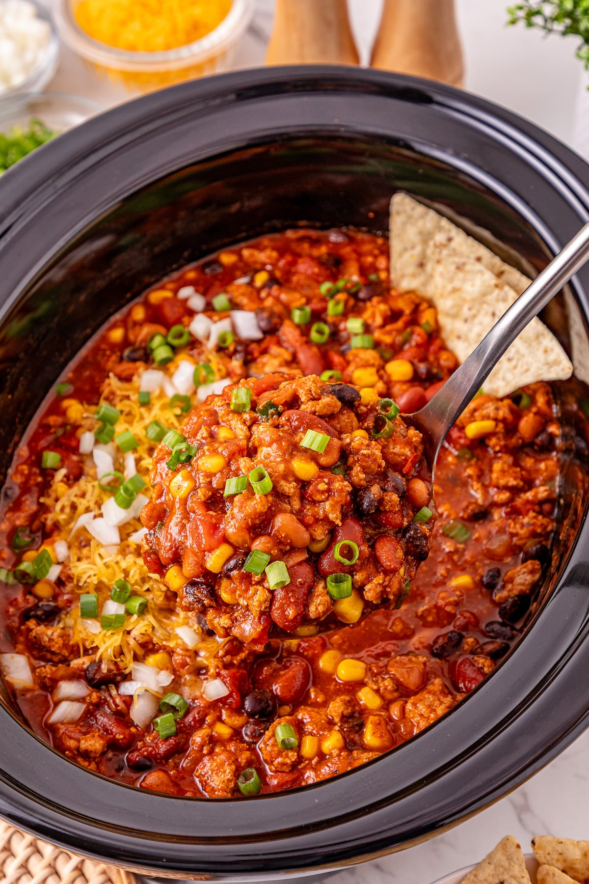 Crockpot turkey chili in slow cooker ready to be served.
