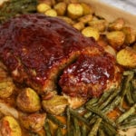 Sheet pan meatloaf and vegetables finished dish, ready to serve.