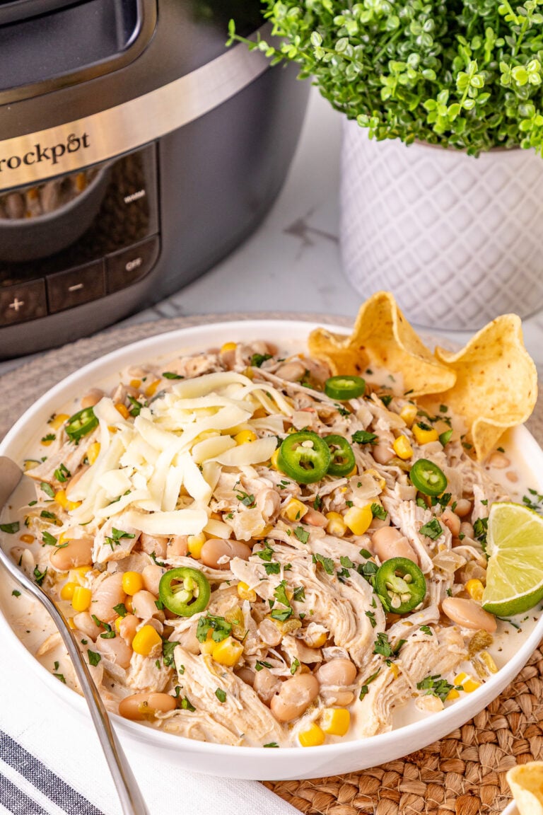 Crockpot white chicken chili in a white bowl.
