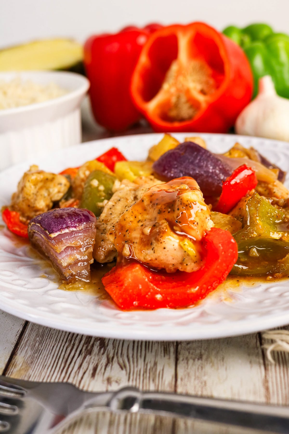 Sheet pan Hawaiian chicken served on a white plate.