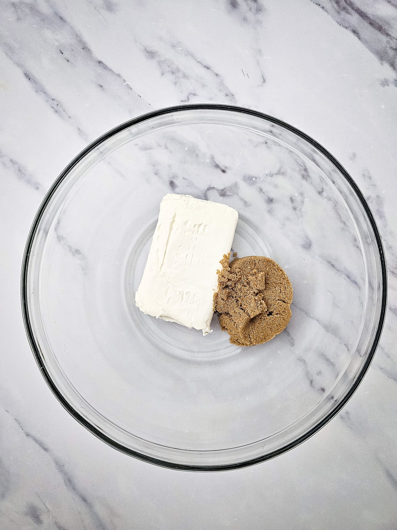 Cream cheese and brown sugar in mixing bowl.