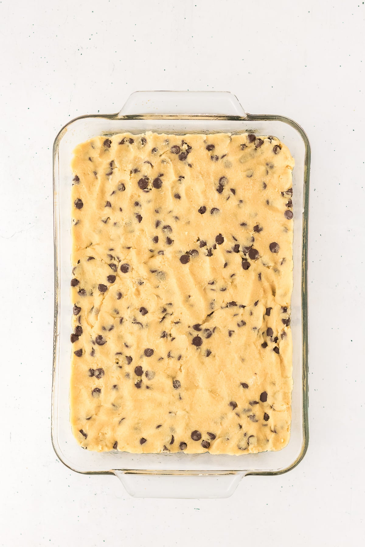 Batter is pressed into the bottom of baking dish and baked.