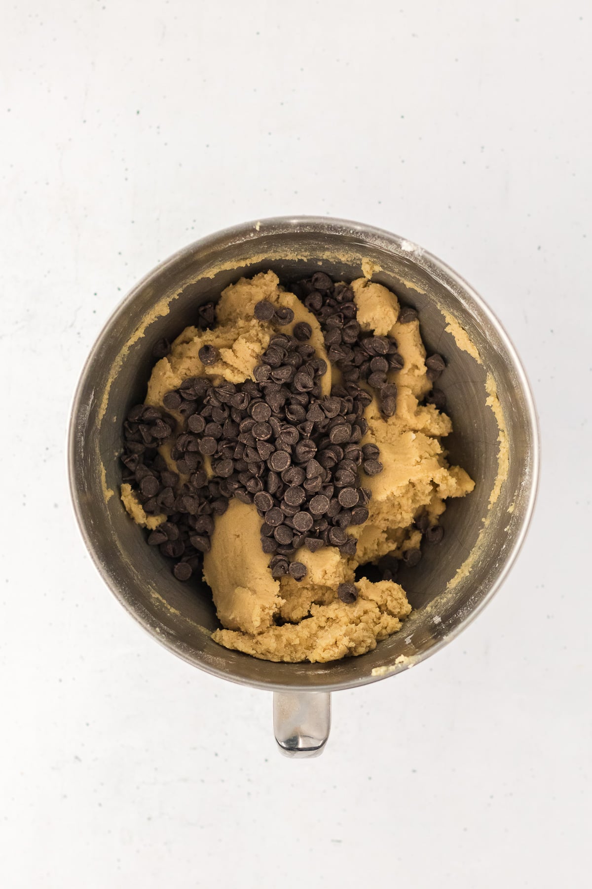 Chocolate chips are folded into the batter.