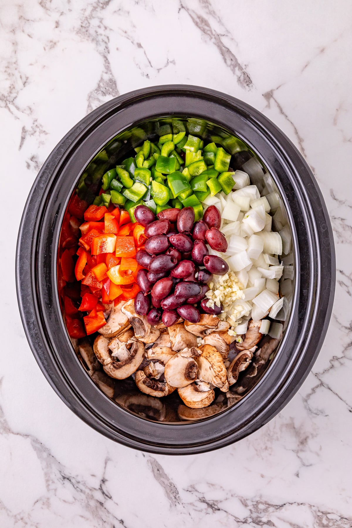 Remaining ingredients are added to the slow cooker.