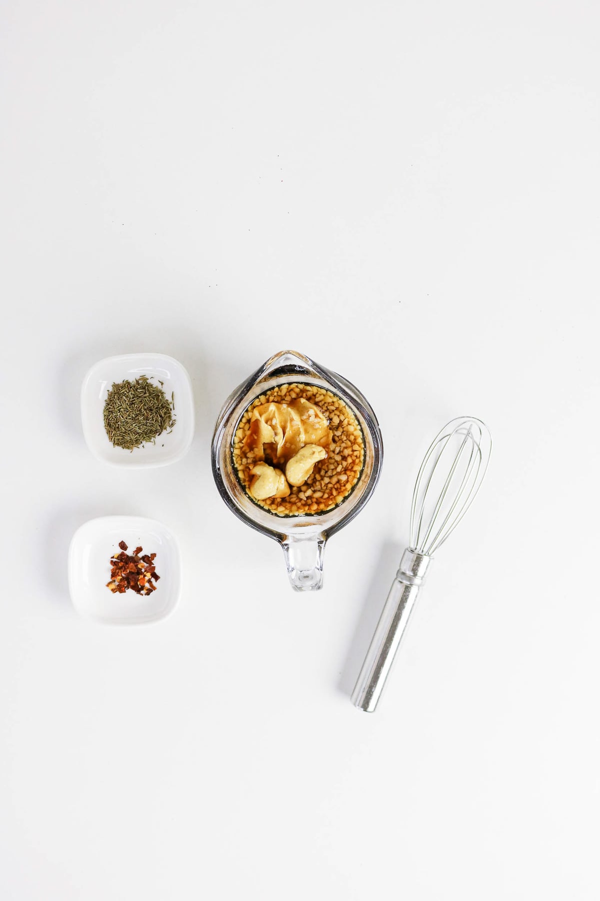 Next set of ingredients in bowl with whisk on the side.