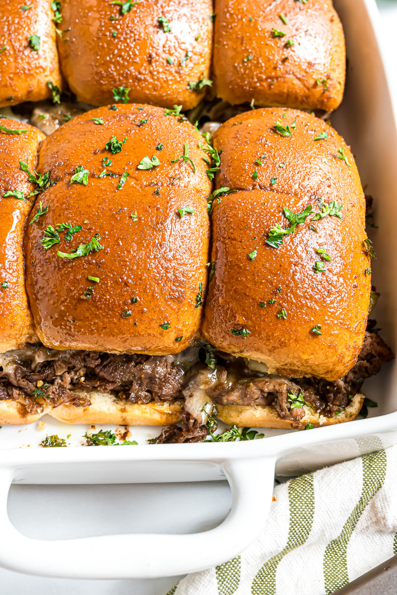 Sliders are ready to be covered with foil and placed in the oven.