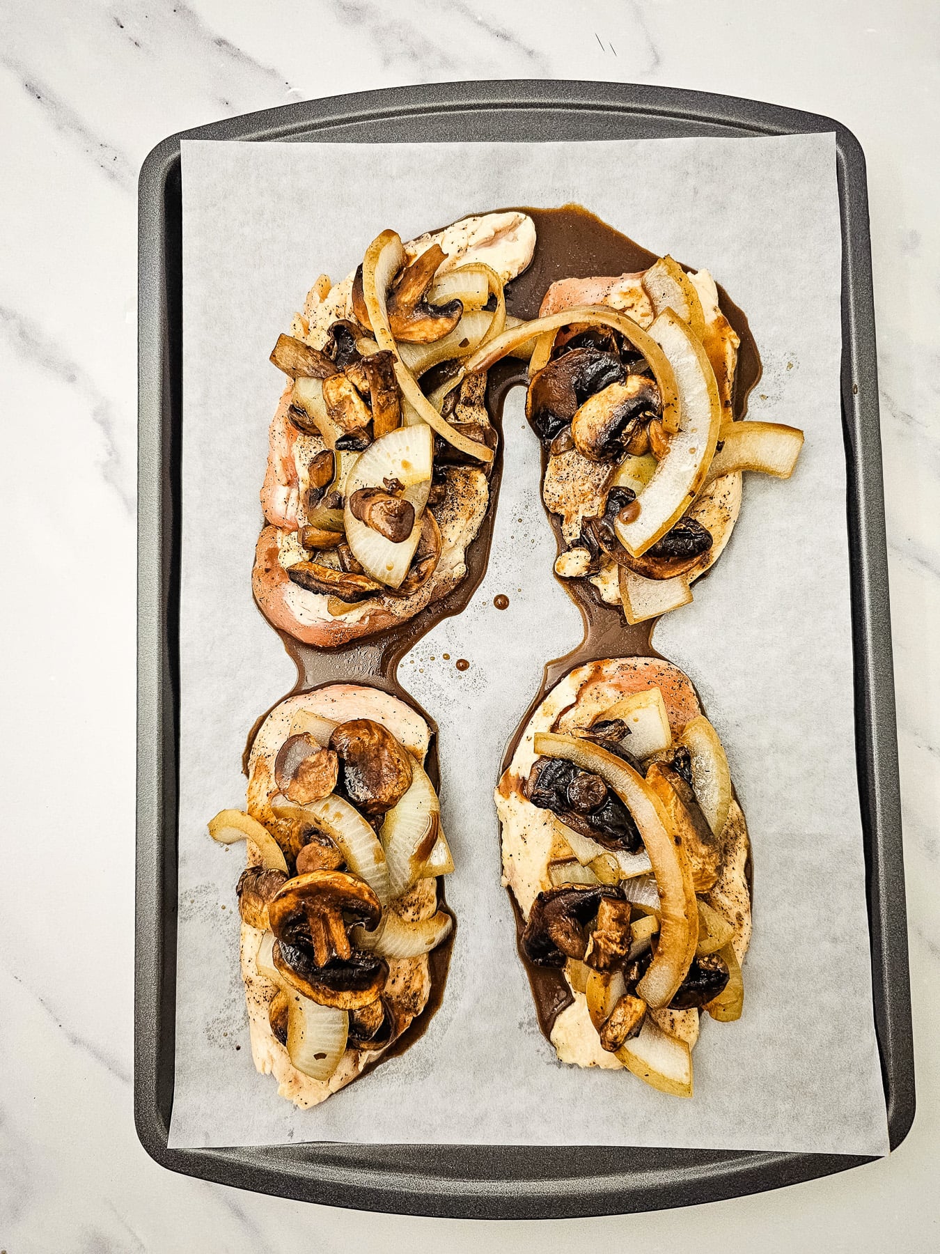 Chicken on sheet pan.