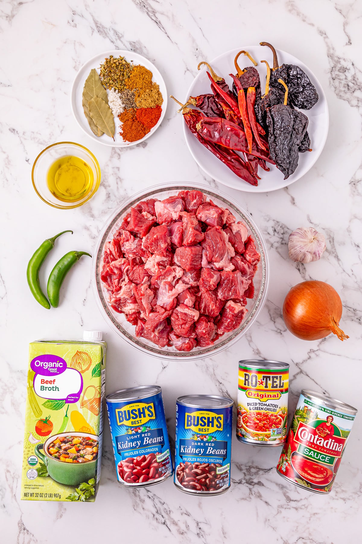 Ingredients for crcokpot steak chile con carne laid out on kitchen counter in prepration for the recipe.