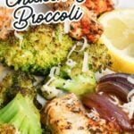 Sheet pan chicken and broccoli served on a white plate.