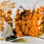 Pumpkin coffee cake on a white plate.