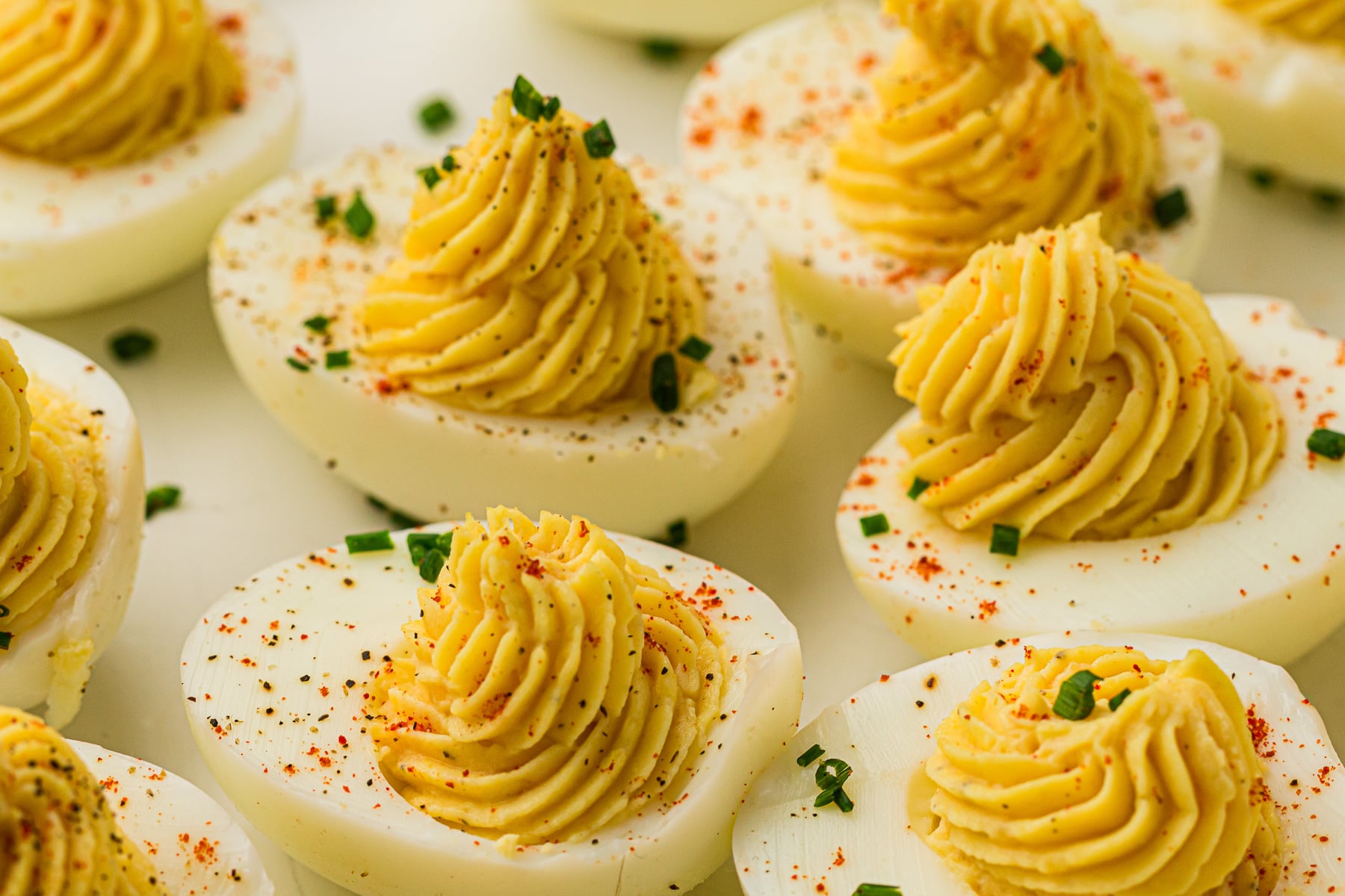 Finished plate of devilled eggs, ready to be served.