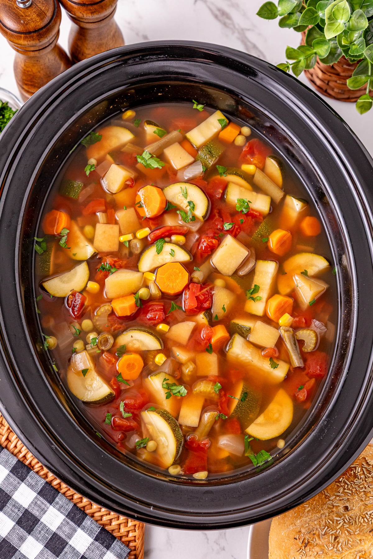 Crockpot vegetable soup in slow cooker.