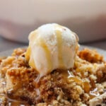 Pumpkin cream cheese dump cake on a white plate.