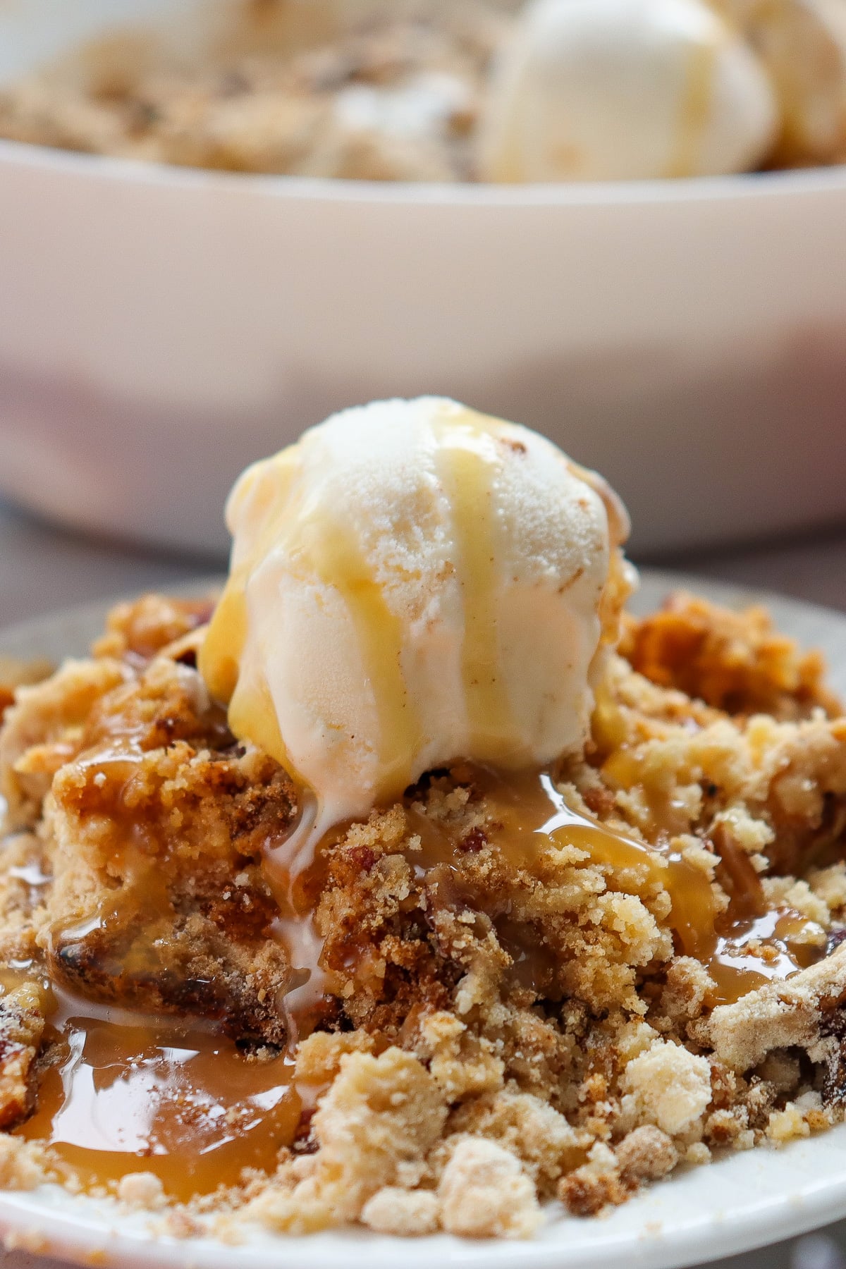 Pumpkin cream cheese dump cake on a white plate.