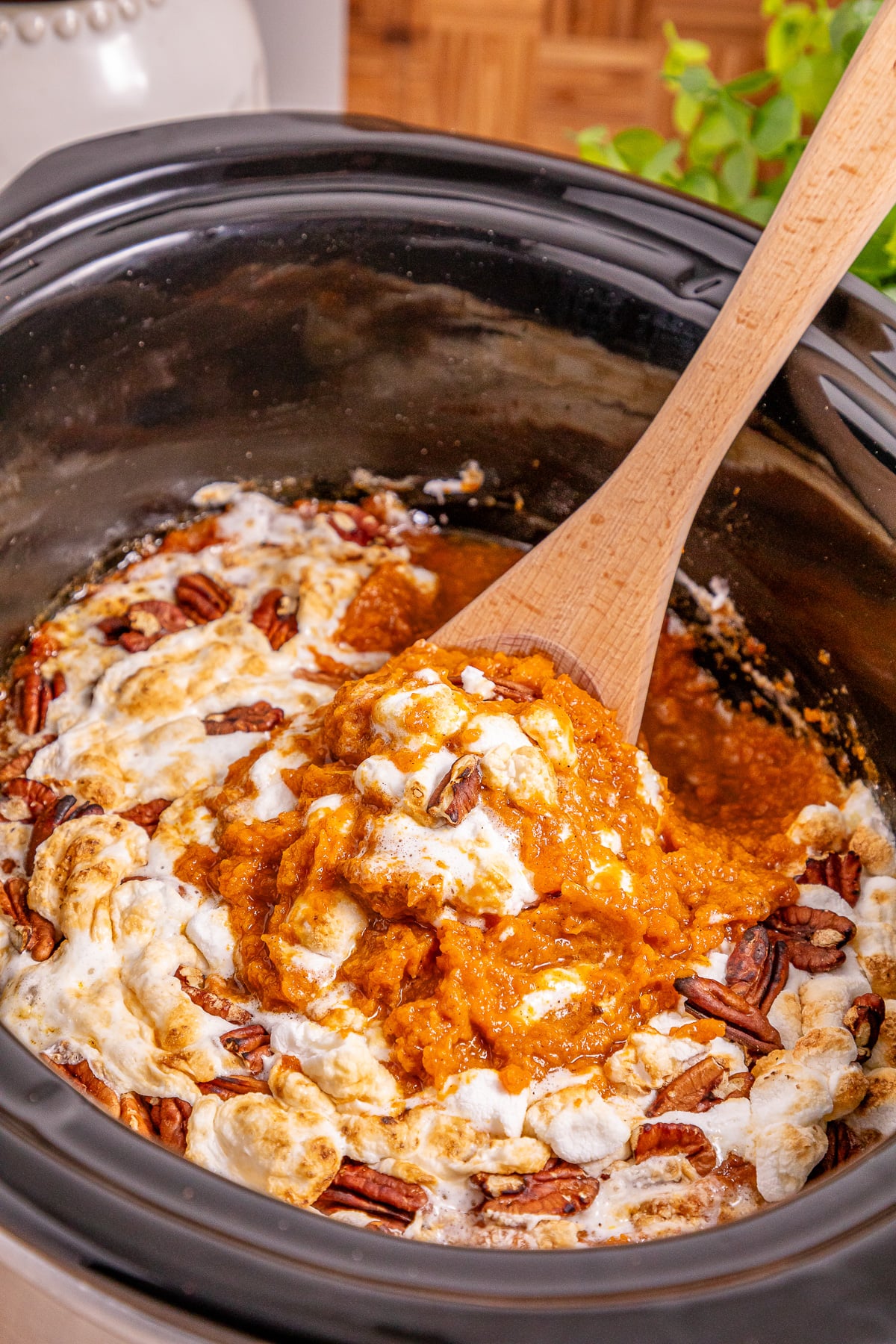 Slow cooker sweet potato casserole in crockpot ready to eat.