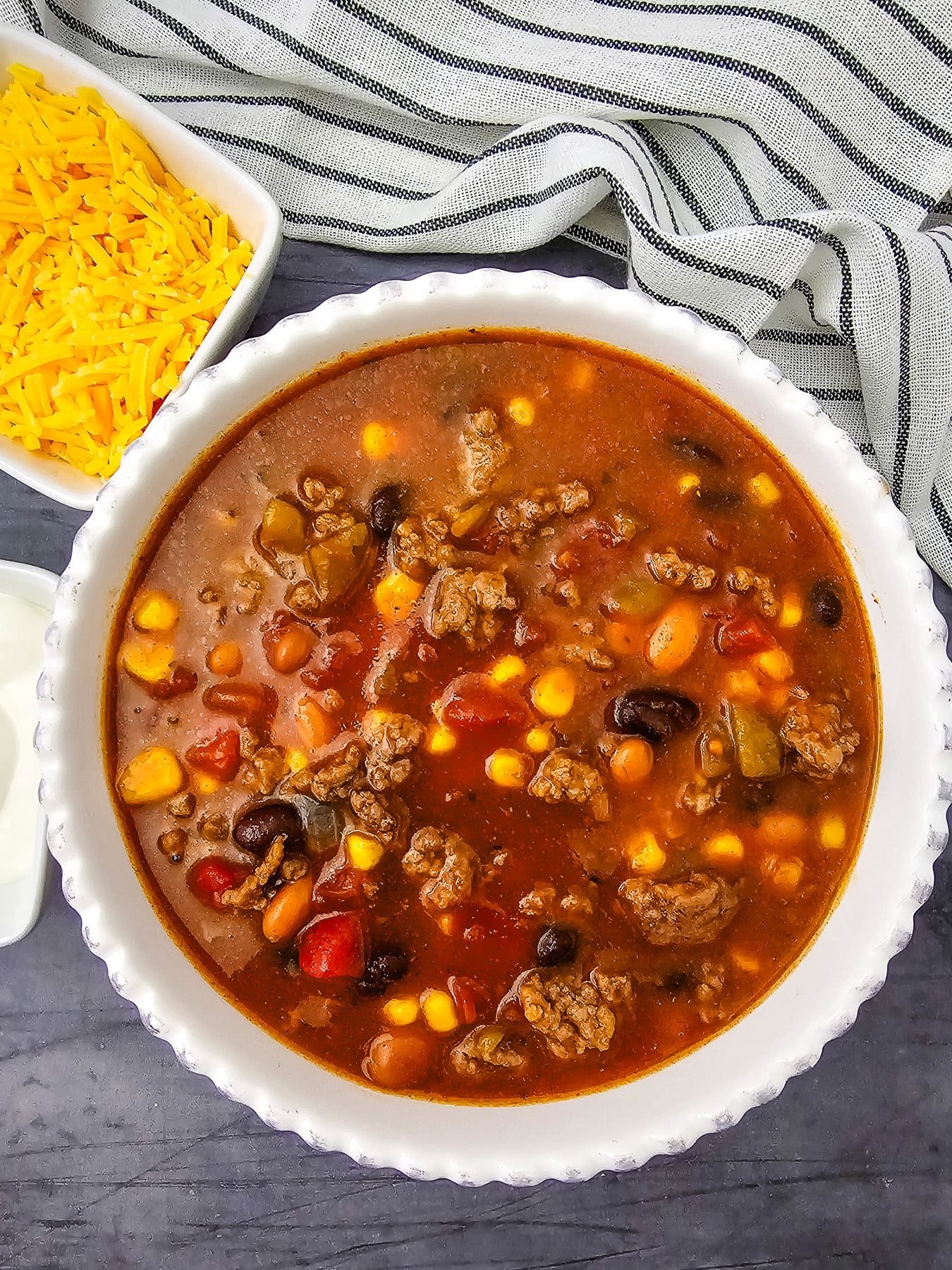 Overhead view of 7 can taco soup.