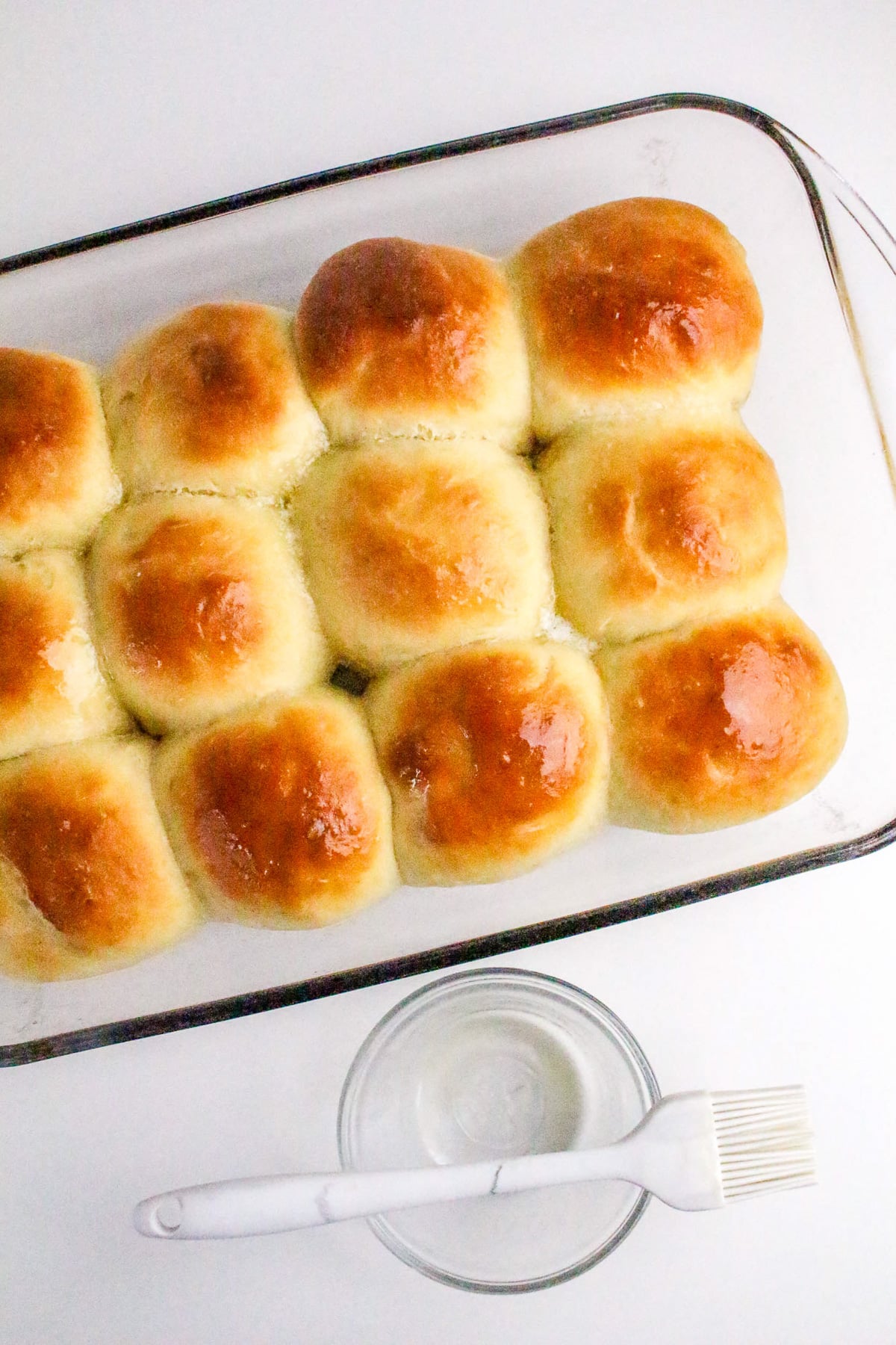Baked dinner rolls in dish.
