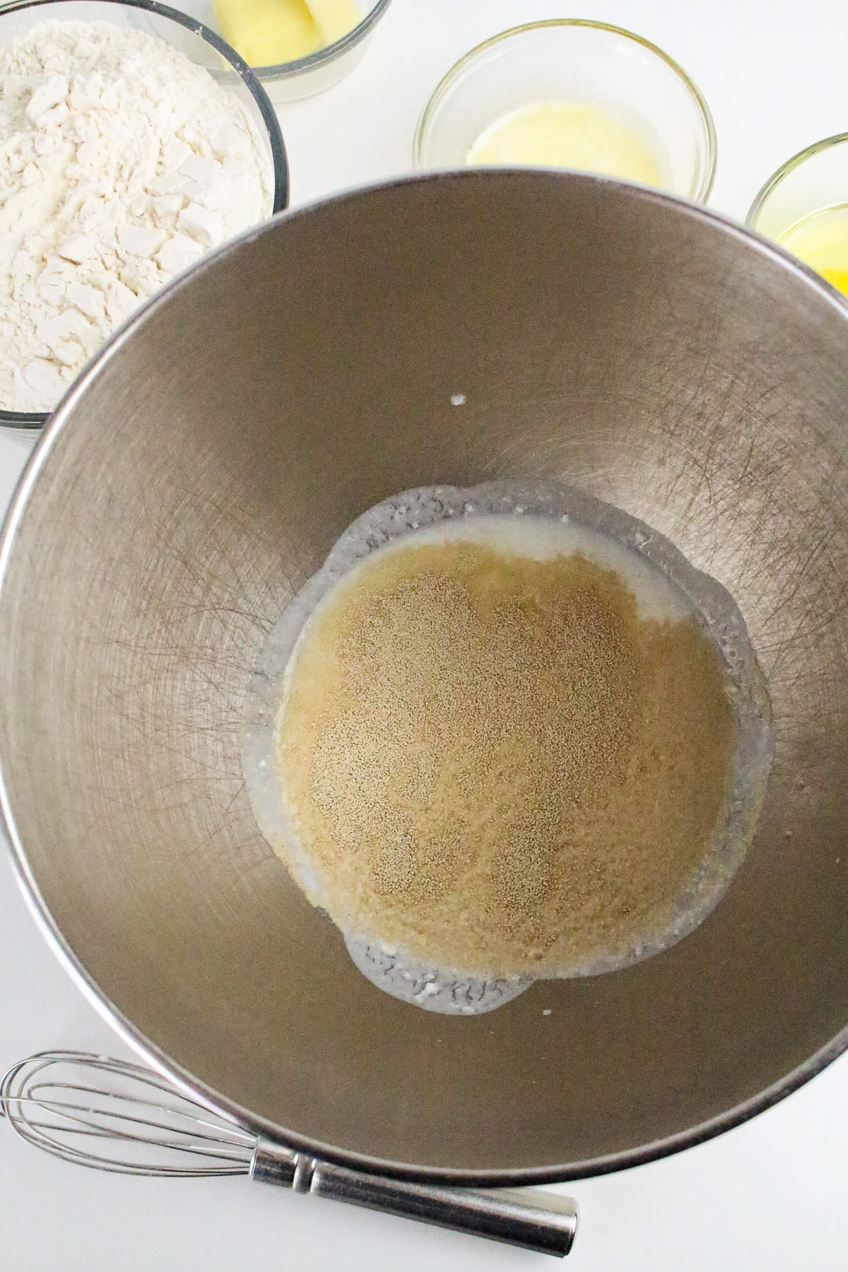 Melted butter, sugar and yeast in mixing bowl.