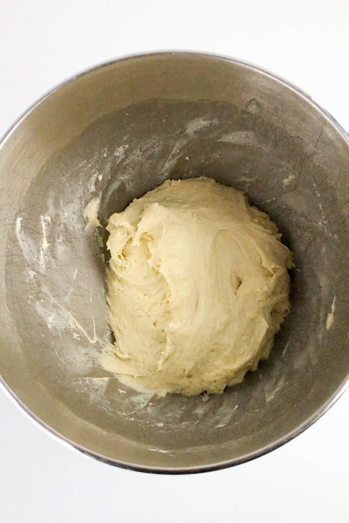 Dough in mixing bowl.