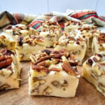 Pecan pie fudge on wooden board.