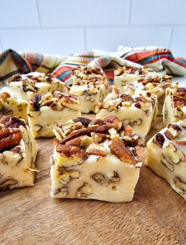 Pecan pie fudge on wooden board.