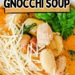 Marry me chicken gnocchi soup in a white bowl with parmesan cheese.