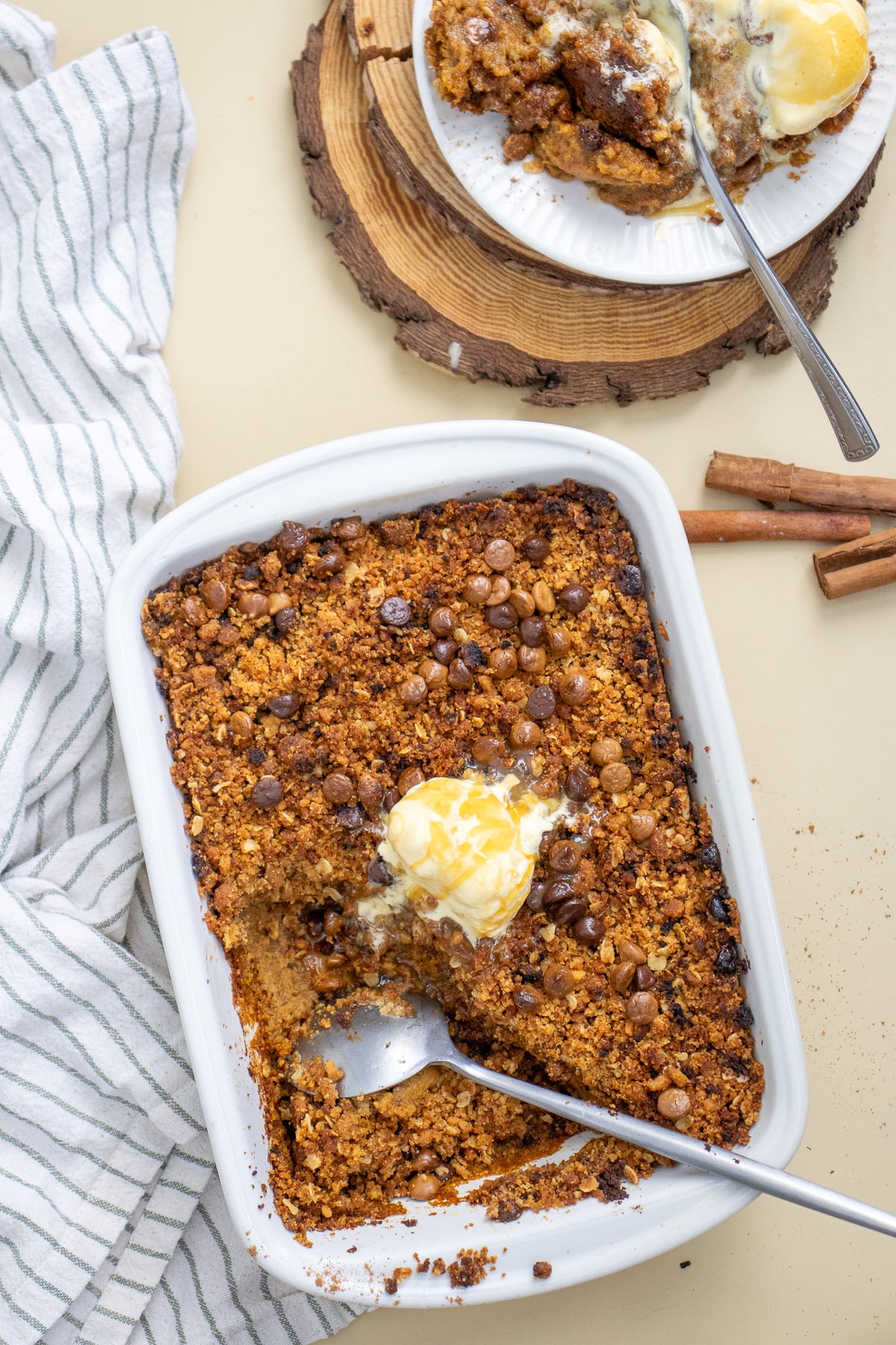 Overhead view of apple crisp in baking dish ready to be served.