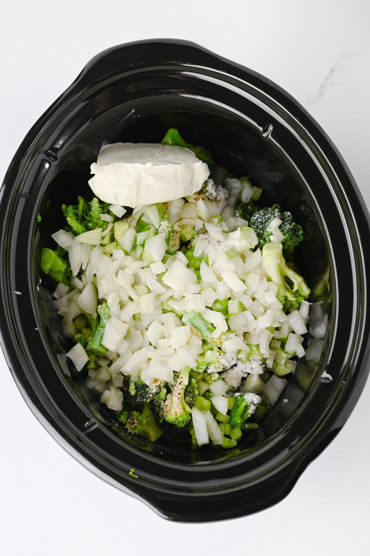 Next set of ingredients are added to the crockpot.