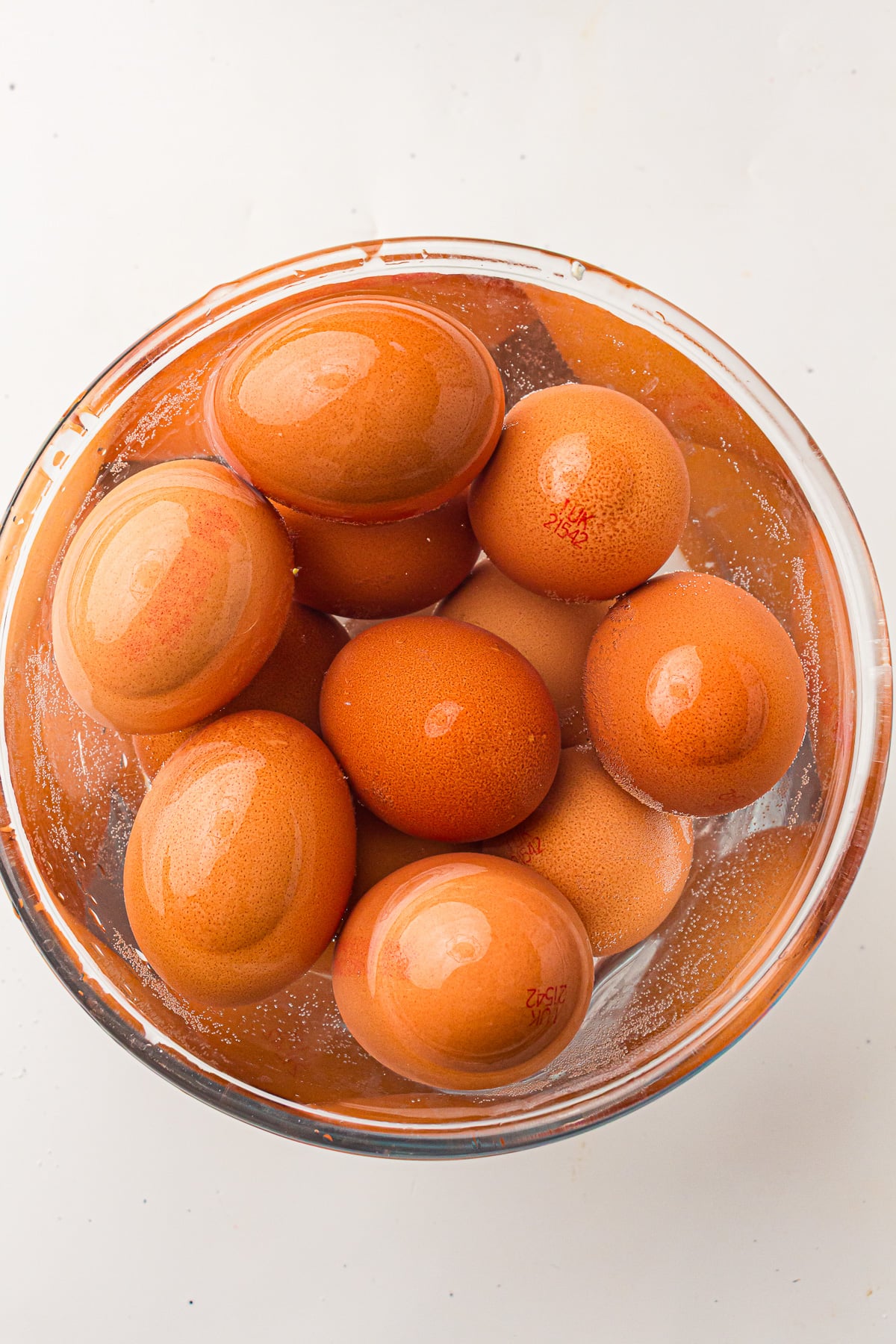 Boiled eggs in bowl in ice water.