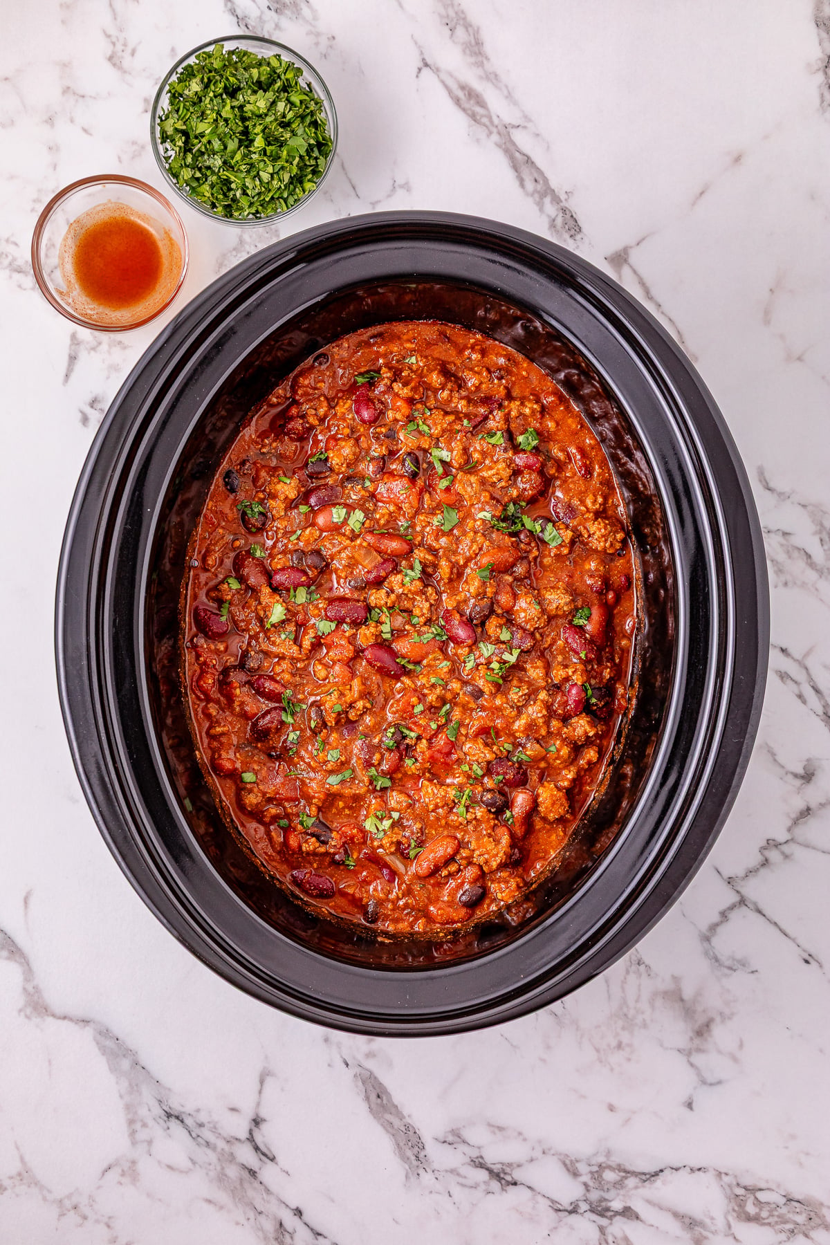 Finished dish of chili in crockpot.