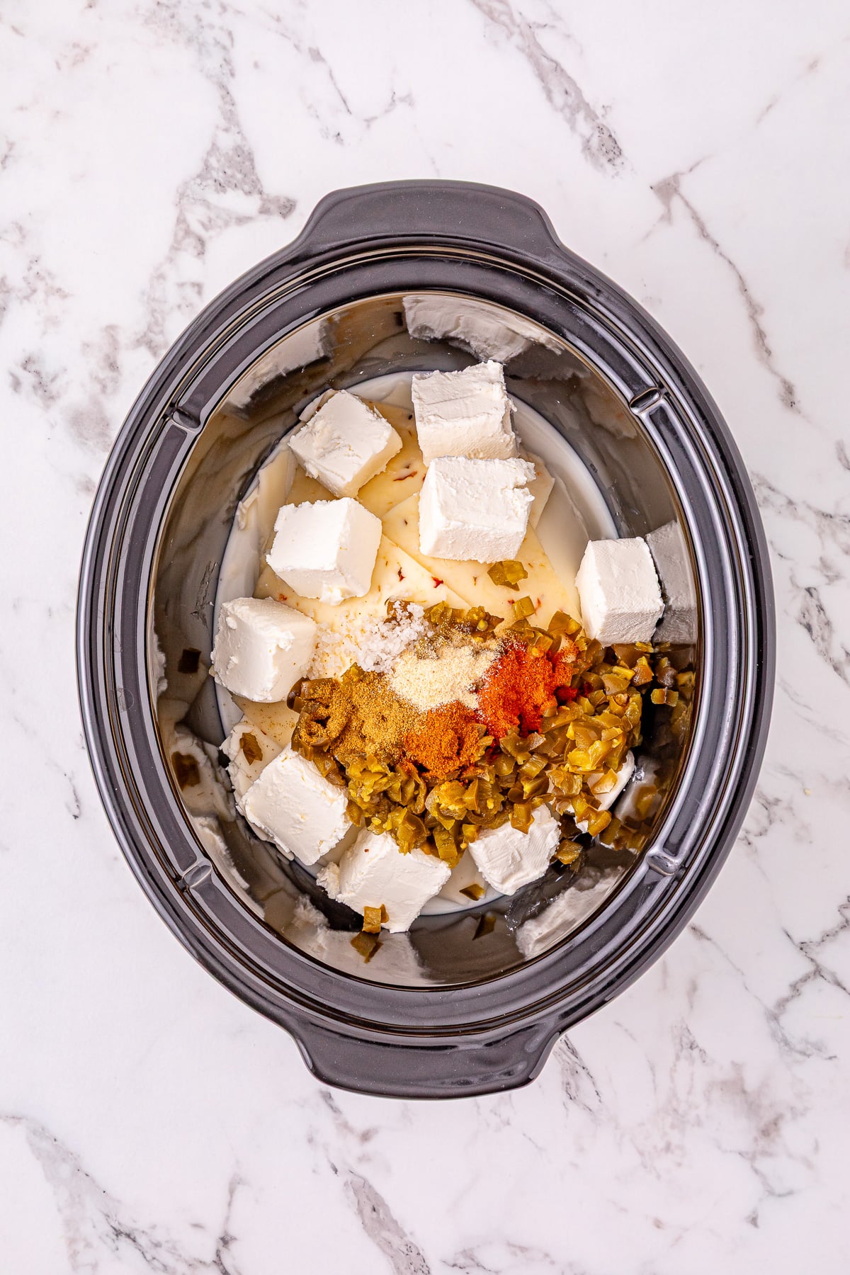 Ingredients are placed in the crockpot.