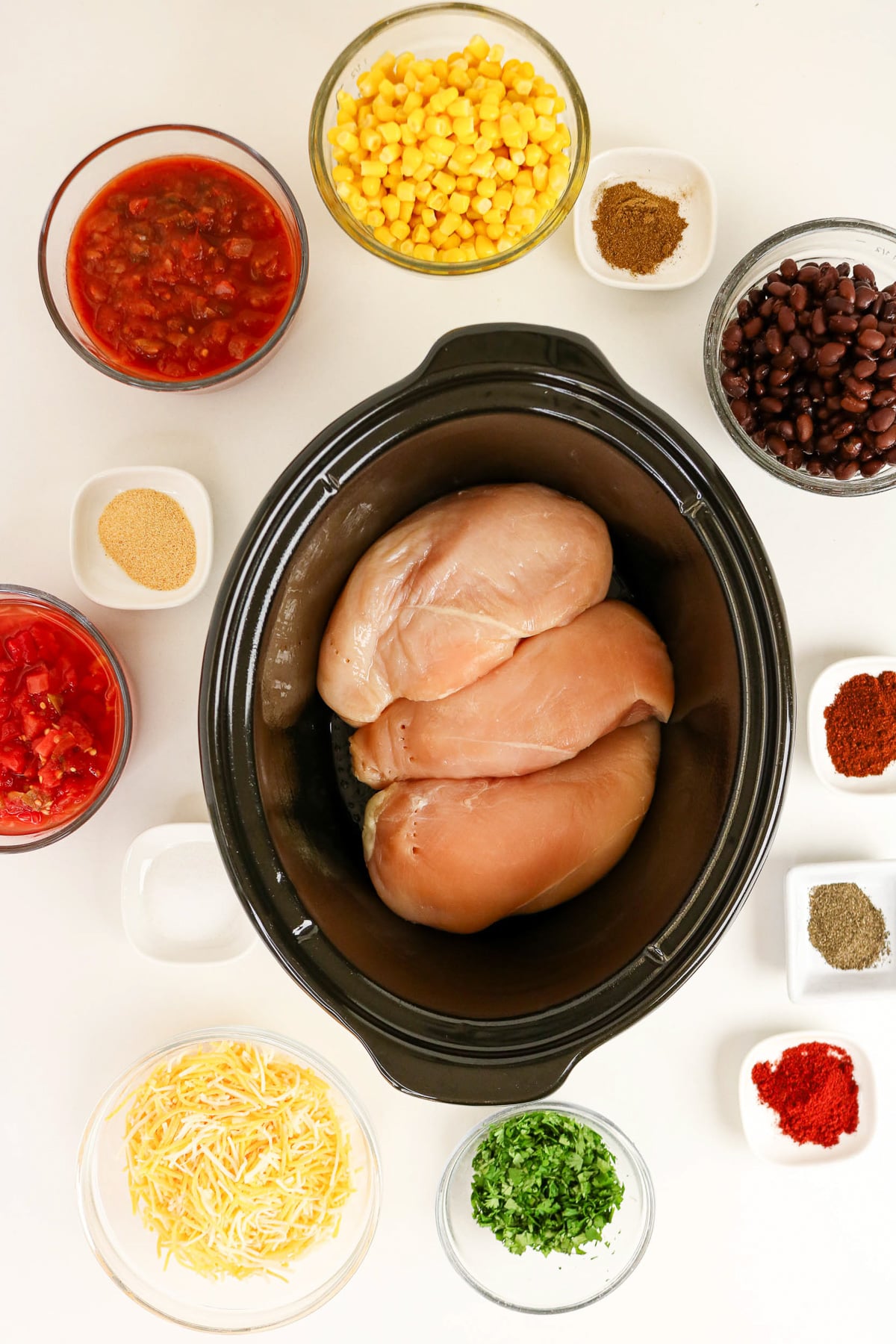 Chicken breasts in bottom of crockpot.
