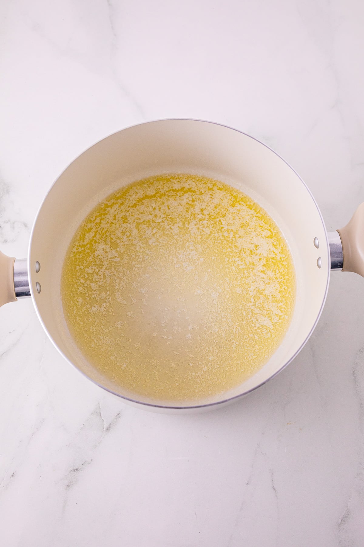 Butter melted in saucepan.