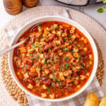Pasta e fagiole soup in a white bowl.