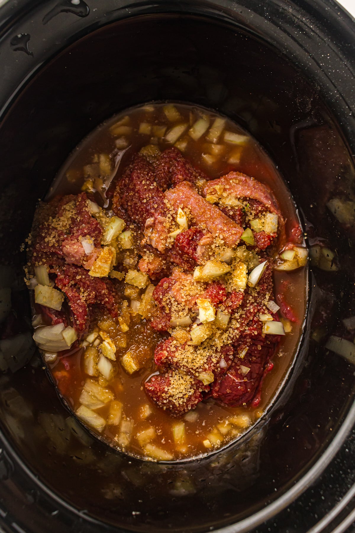 First set of ingredients in slow cooker.