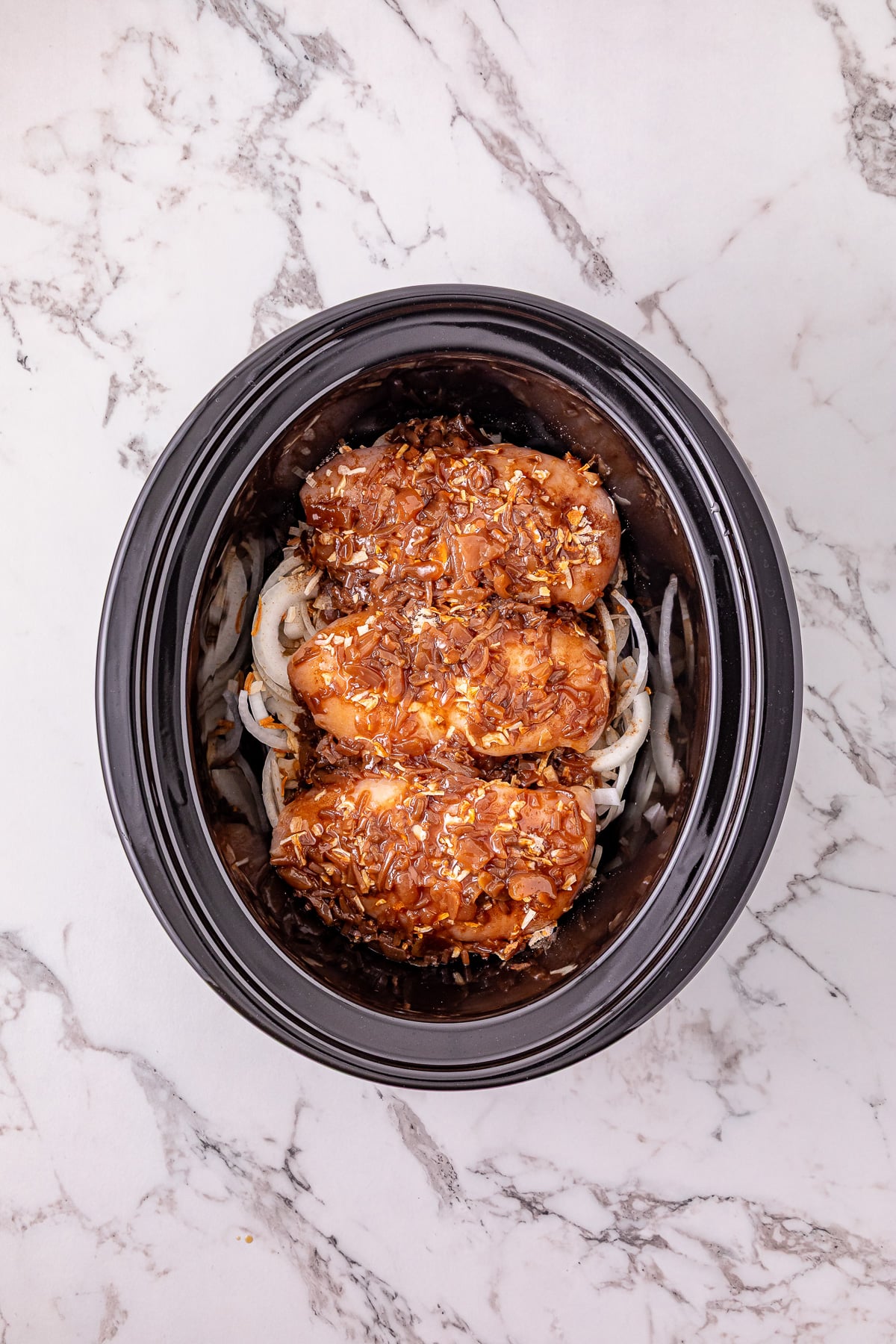 Chicken broth on top of chicken.