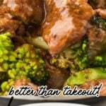 Slow cooker beef and broccoli served in a shallow white bowl.